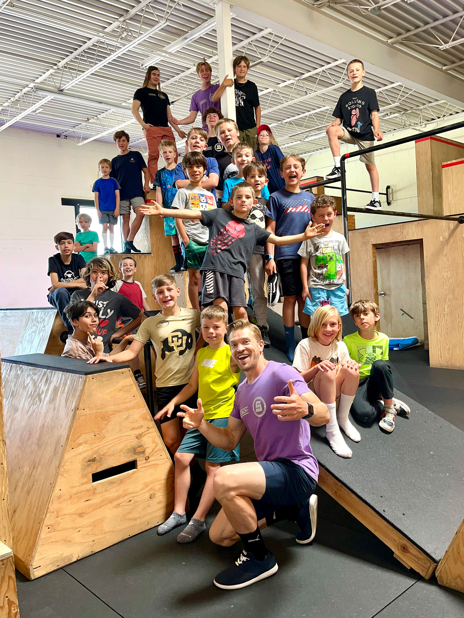 Students participating in a Superhuman Academy parkour camp